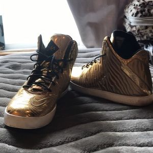 Gold LeBron’s men’s sneakers size 8 1/2 fits woman